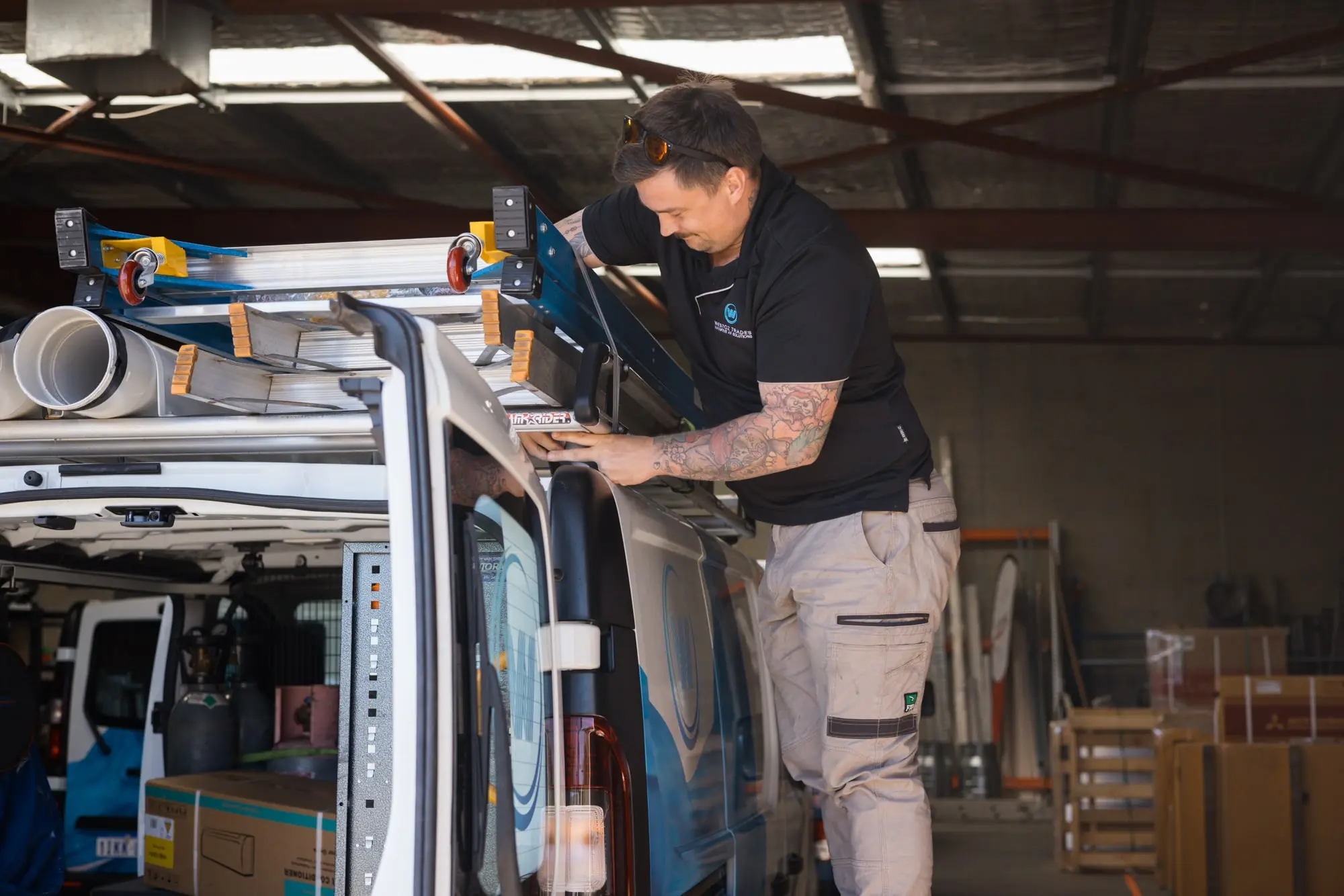 WestOz technician securing tools and equipment on a service vehicle before heading to a job site